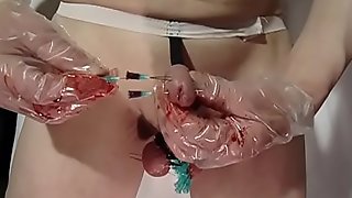 4 needles straight through head of penis